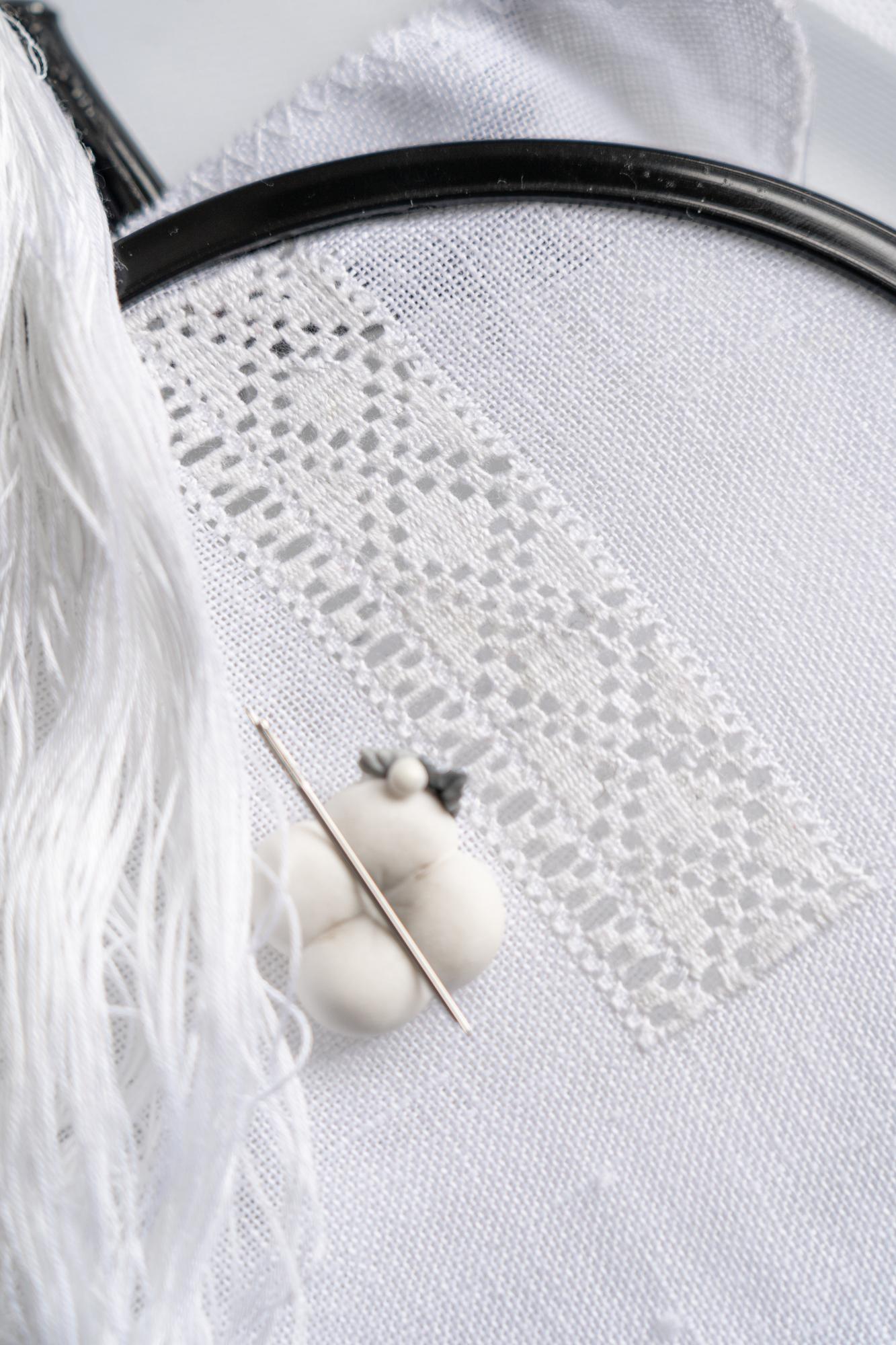 Table runner with delicate border embroidery